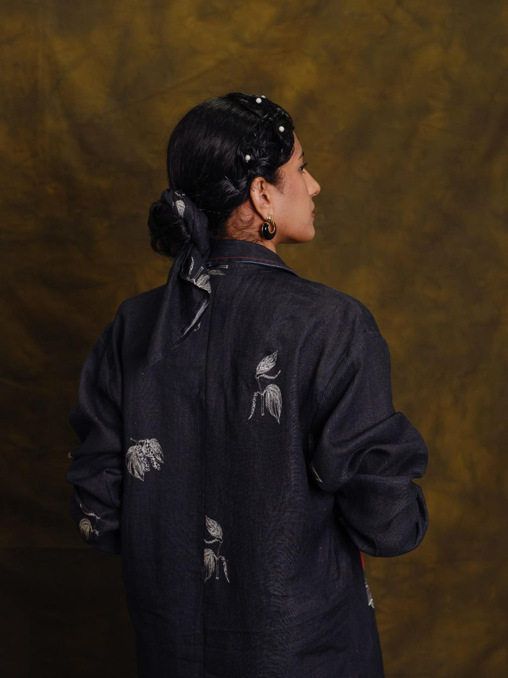 Mulaku shirt signature
